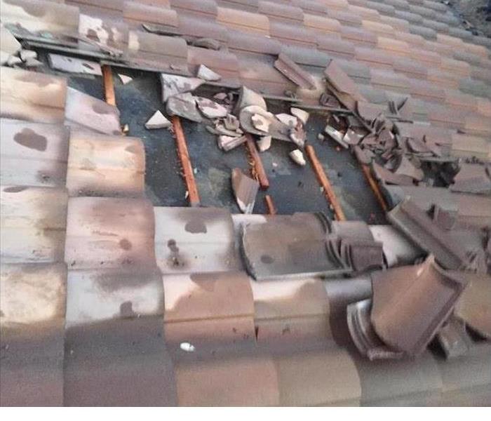 missing roof tiles from high winds 
