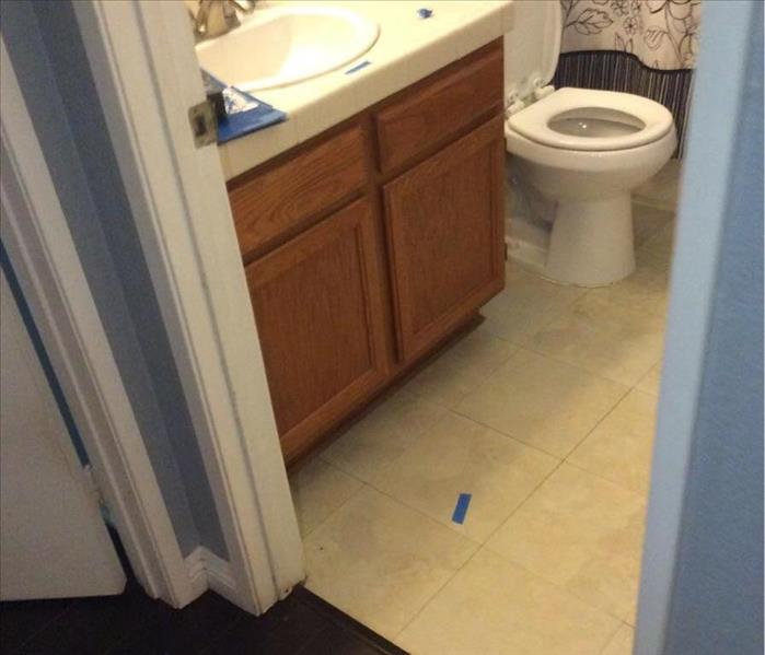 water loss in hall bathroom, floor damaged 