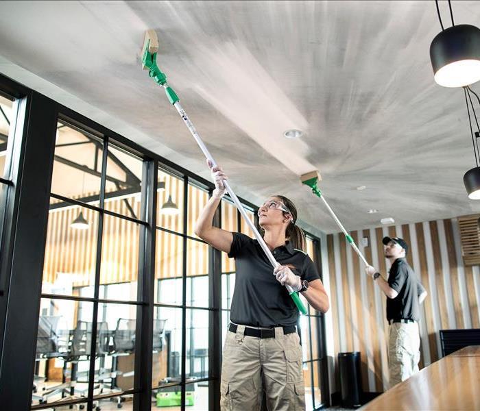 Image of a ceiling tool cleaning debris and 6 circles with each individual step of the SERVPRO® cleaning process. 
